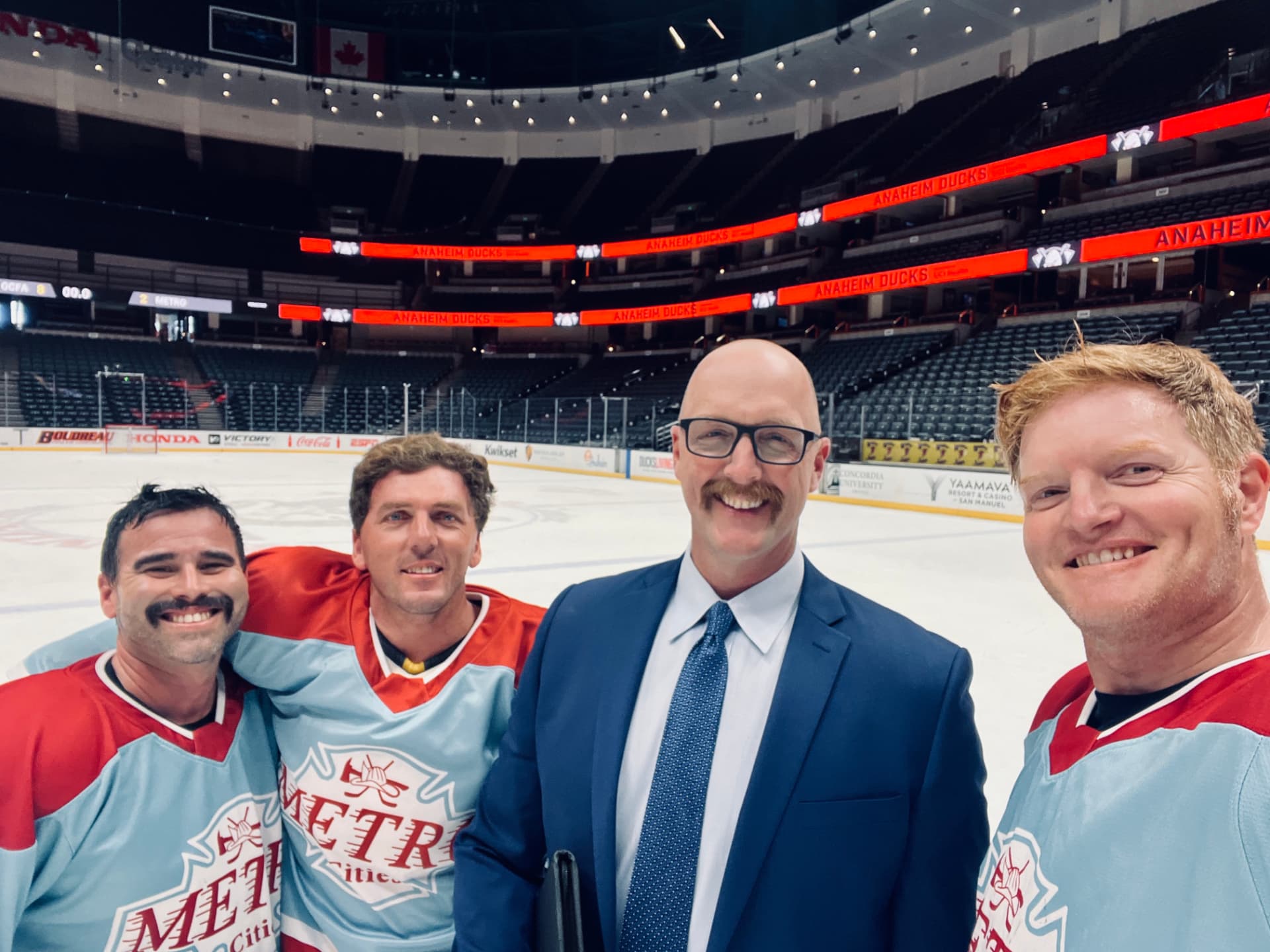 Metro Cities teammates off the ice
